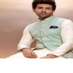 Inq Tmp 32 शूटिंग छोड़ फैमिली फंक्शन अटेंड करने पहुंचे Kartik Aaryan